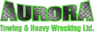 A green and black logo for heavy wrecker service.