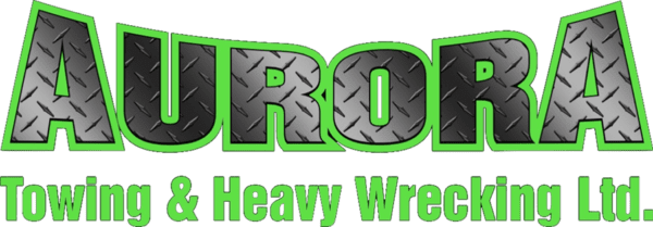 A green and black logo for heavy wrecker service.